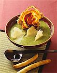 Cress soup with parmesan flakes and fried bacon