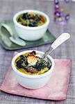 Spinach,goat's cheese and raisins au gratin