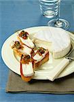 Camembert on toasts with confit onions