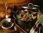 Beef and carrot stew in casserole dish