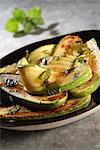 Sliced grilled zucchinis with mint