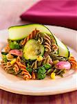 Three-colored pasta and vegetable salad