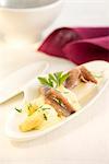 White asparagus and anchovies with butter sauce