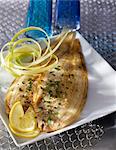 Pan-fried soles with herbs and lemon