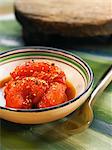 Preserved tomatoes with sesame seeds