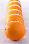 Lined up oranges