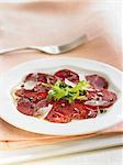 Veal carpaccio with lamb's lettuce