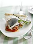 Sea bream cooked in wax paper