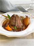 Veal's cheeks in wine sauce