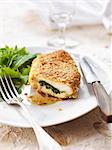 Chicken breast stuffed with herbs and cooked in breadcrumbs