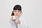 Girl Listening With Stethoscope