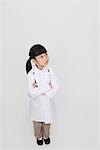 Girl Dressed Up As Doctor Pointing