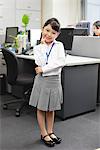 Girl as Office Worker in Office