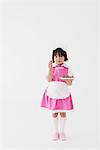 Japanese Girl holding Plate of Strawberry