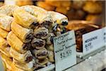 Australia, Victoria, Melbourne.  Pastries for sale at Queen Victoria Market.