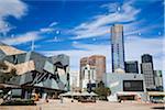 Australia, Victoria, Melbourne.  Federation Square with Southbank and the Eureka Tower in the background.