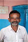 India, Cochin. A friendly Keralan shop-keeper.