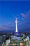 Asia, Japan. Kyoto, Kyoto Tower illuminated at dusk