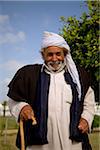 Misrata, Libya; An elderly man in traditional clothes posing for the photographer