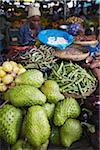 Woman selling fruit and vegetables in municipal market, Maputo, Mozambique