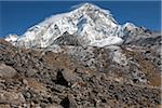 Nepal, Everest Region, Khumbu Valley. Mount Everest view from the edge of lateral moraine on the Khumbu Glacier