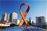 AIDS ribbon sculpture with downtown skyscrapers in background, Durban, KwaZulu-Natal, South Africa