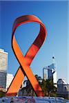 AIDS ribbon sculpture with downtown skyscrapers in background, Durban, KwaZulu-Natal, South Africa