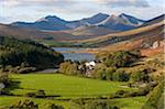 UK, North Wales, Snowdonia.  The Snowdon Horseshoe rises above  Llyn Mymbr.