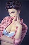 Portrait of Woman Dressed as 1950s Pin-Up Girl