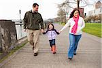 Family Walking along Waterfront