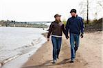 Couple Walking beside River