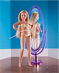 Plus Size Doll Measuring Waist in front of Mirror