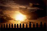 Moonrise over the fifteen colossal stone statues or moais of Tongariki. The moais stand on their platform or ahu on the eastern coast of the island at the foot of the Poike Peninsula. Ahu Tongariki is the largest platform on the island at over 200m in length and has the most maois.