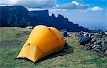 View towards escarpment from Chenek camp, Simien mountains, Ethiopia.The Simien range lies north of Gondar and to the east of the main road to Axum.It is one of Africas largest mountain ranges.These tracks make ideal walking routes and, combined with the ranges impressive scenery, make the Simiens an excellent area for trekking.