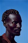 The distinctive hair style of this Dassanech man, achieved using a combination of clay, animal fat and ochre, signifies that he has killed a man recently. Much the largest of the tribes in the Omo Valley numbering around 50,000, the Dassanech, also known as the Galeb, Changila or Merille, are Nilotic pastoralists and agriculturalists.