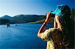 A tour boat motors across the flooded plain in Periyar National Park.The Periyar National Park and Tiger Reserve is situated within the confines of the Western Ghats in the southern Indian state of Kerala, it spreads over 350 sq km.