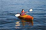 girl kayaking in puget sound
