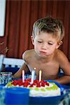 A boy with a birthday cake, Sweden.