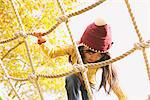 Girl Climbing On Ropes