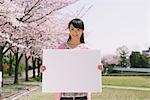 Young Woman Holding White Board