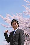 Businessman in Front of Cherry blossoms