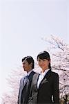 Businesspeople in Front of Cherry blossoms