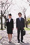 Businesspeople under the Cherry blossoms