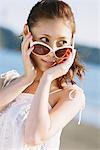 Young Woman Wearing Sunglasses