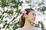Portrait Of Beautiful Japanese Young Woman Wearing Flower