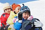 Children Sliding Downward In Snow