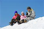 Family Having Fun In The Snow