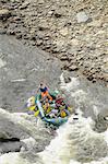 View overlooking rafters on the Talachulitina River about to run the rapids, Interior Alaska, Summer