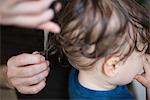 Toddler getting a haircut, cropped