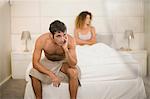 Couple arguing in bedroom